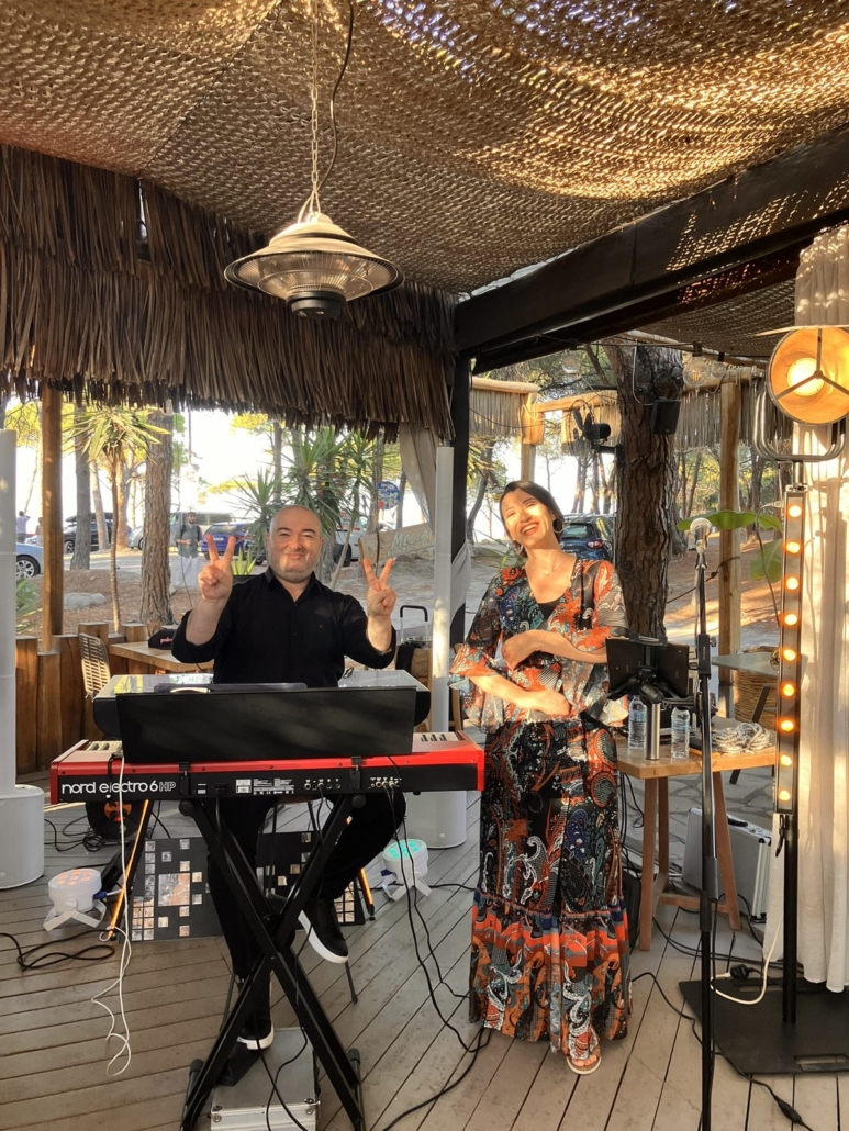 Live band duo performing at Melia Restaurant Vourvourou during wedding dinner