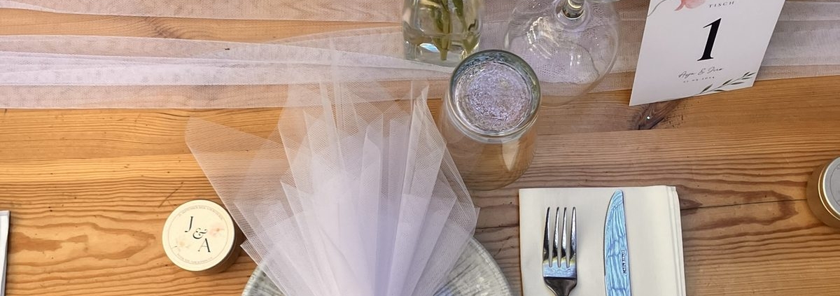 Wedding table detail with flowers and German table number cards - Asja and Jiro Halkidiki