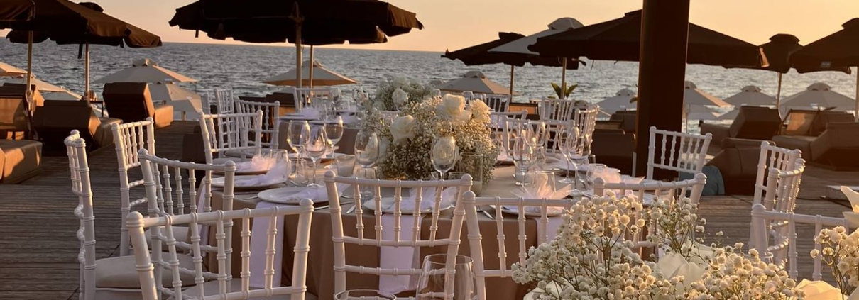 Wedding reception venue at Mango Beach Bar, Parga Greece – sunset over the Ionian Sea